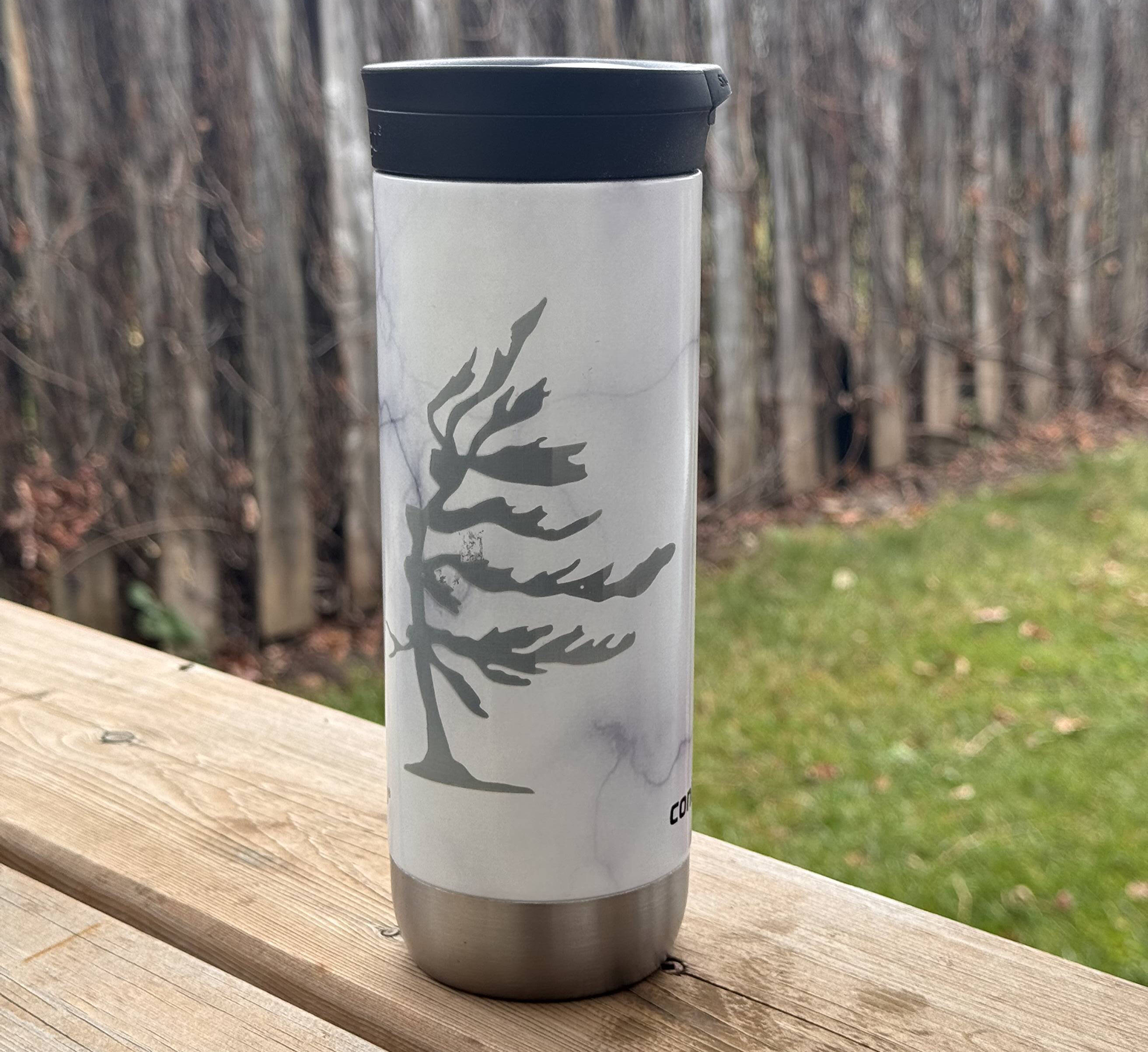Engraved tumbler with a nature design